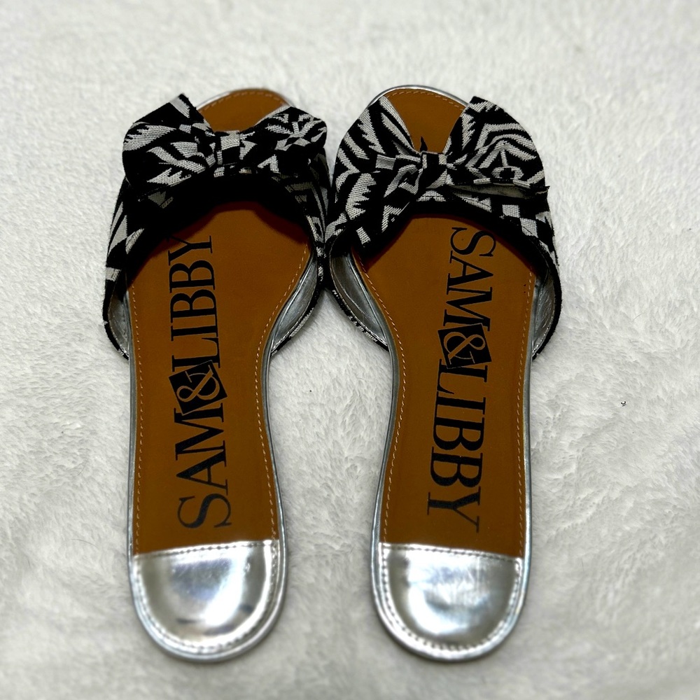 Sam and Libby black and white, slip ons with silver details.
